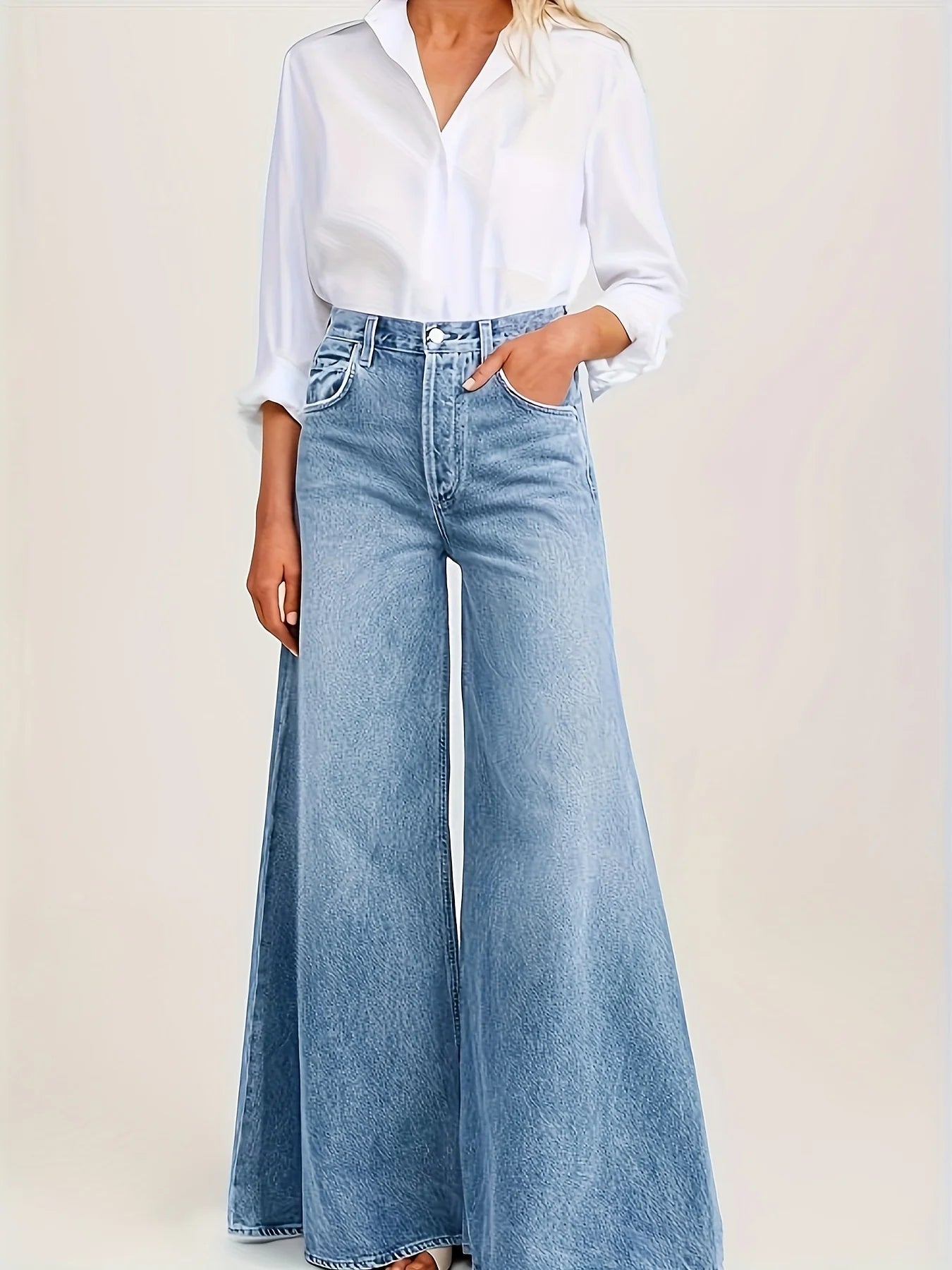 Women's high-waisted light wash wide leg jeans with relaxed fit denim style