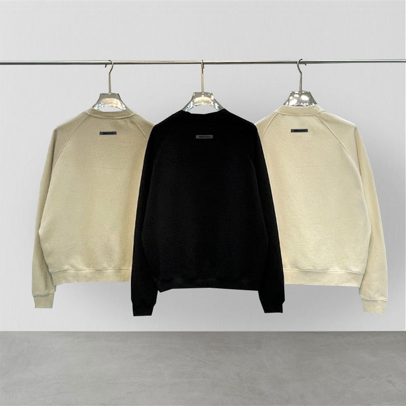 ESSENTIALS 77 Top Unisex Sweatshirt